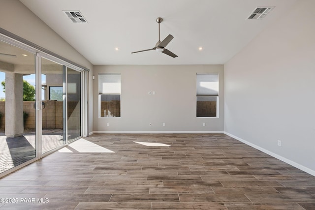 5268 Tranquil Bluff Way, Prescott, AZ 86301 - spare room with wood finished floors, lofted ceiling, ceiling fan, baseboards, and recessed lighting