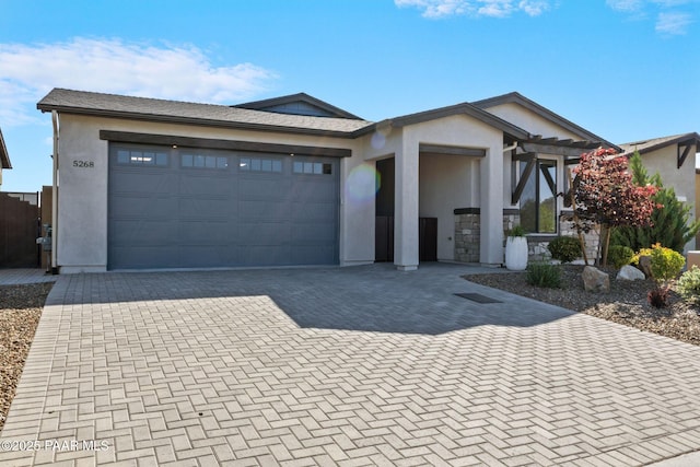 5268 Tranquil Bluff Way, Prescott, AZ 86301 - single story home featuring stucco siding, decorative driveway, an attached garage, and a pergola