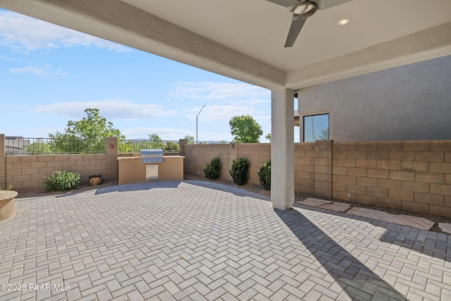 5268 Tranquil Bluff Way, Prescott, AZ 86301 - fenced backyard featuring exterior kitchen, a ceiling fan, and a patio area