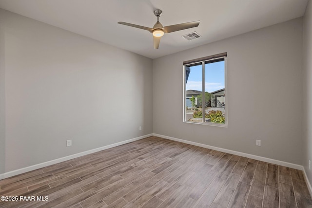 5268 Tranquil Bluff Way, Prescott, AZ 86301 - unfurnished room with wood finished floors, baseboards, and a ceiling fan