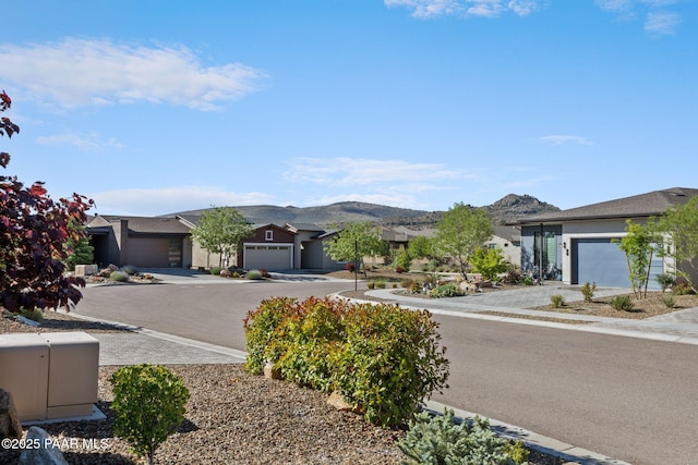 5268 Tranquil Bluff Way, Prescott, AZ 86301 - view of yard featuring driveway, a mountain view, and a garage