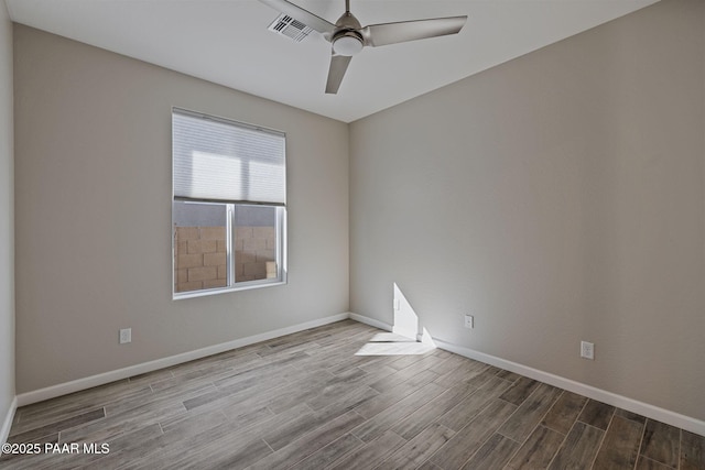 5268 Tranquil Bluff Way, Prescott, AZ 86301 - empty room with wood finished floors, a ceiling fan, and baseboards