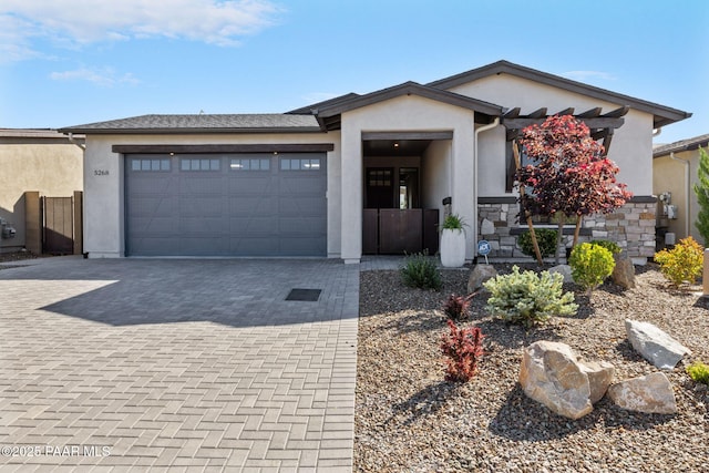 5268 Tranquil Bluff Way, Prescott, AZ 86301 - view of front of home with stucco siding, decorative driveway, and a garage