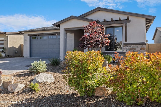 5268 Tranquil Bluff Way, Prescott, AZ 86301 - ranch-style home with stucco siding, an attached garage, and driveway