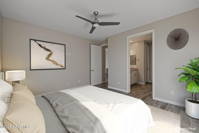 5268 Tranquil Bluff Way, Prescott, AZ 86301 - bedroom featuring dark wood finished floors, baseboards, ensuite bath, and ceiling fan
