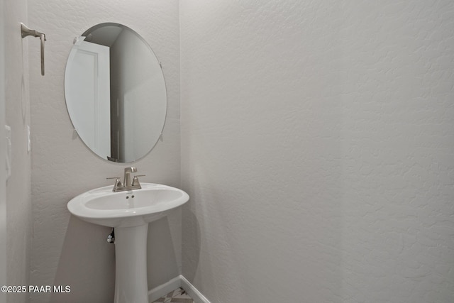 5268 Tranquil Bluff Way, Prescott, AZ 86301 - bathroom with a textured wall and baseboards