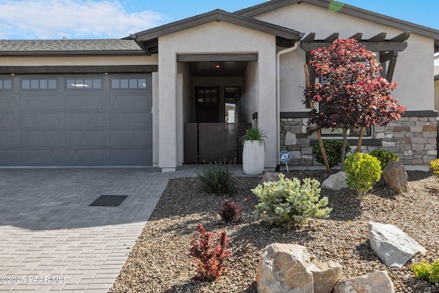 5268 Tranquil Bluff Way, Prescott, AZ 86301 - view of front of property with a garage, decorative driveway, and stucco siding