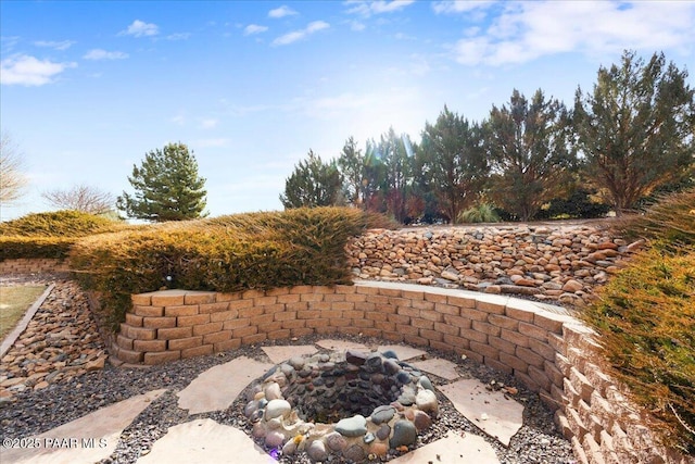 view of patio featuring a fire pit