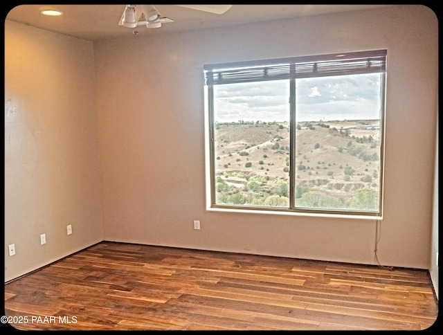 10614 E High Point Dr, Dewey-Humboldt, AZ 86327 - spare room with ceiling fan and wood finished floors
