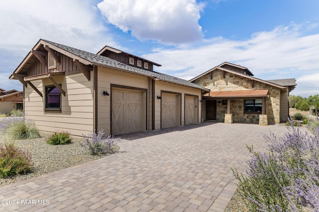 view of front of property featuring a garage