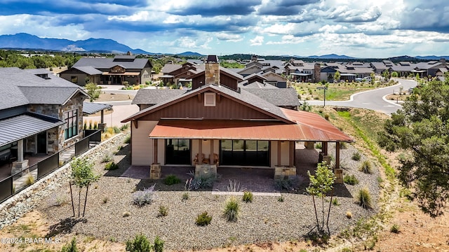 view of front of property with a mountain view