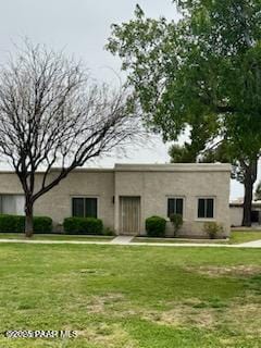 view of front facade with a front lawn