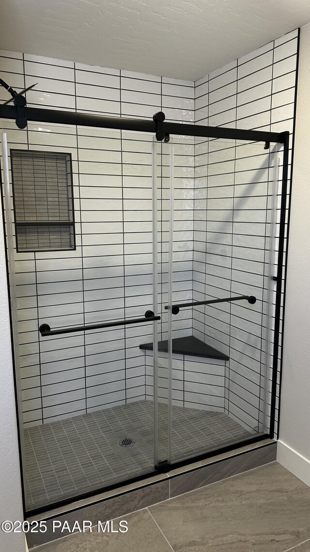 bathroom featuring ceiling fan, vanity, and tile patterned floors