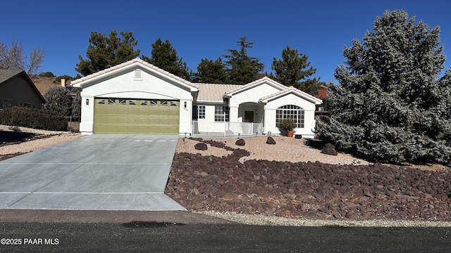 ranch-style home featuring a garage