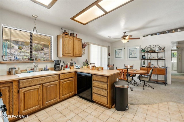 9331 Serpentine Ln, Prescott Valley, AZ 86314 - kitchen with black dishwasher, a peninsula, light countertops, a ceiling fan, and decorative light fixtures