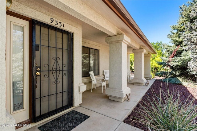 9331 Serpentine Ln, Prescott Valley, AZ 86314 - entrance to property featuring covered porch and stucco siding