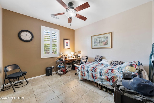 bedroom featuring light tile patterned flooring, visible vents, a ceiling fan, and baseboards