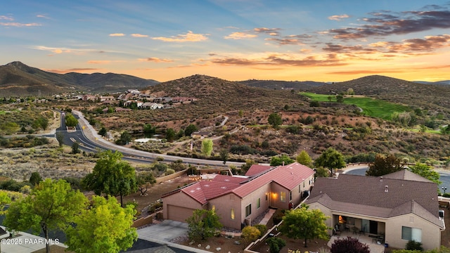 aerial view at dusk with a mountain view