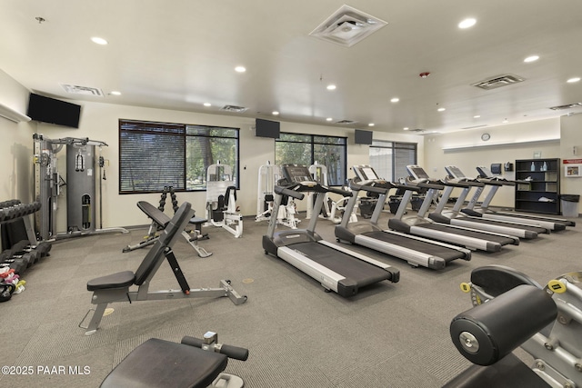 exercise room featuring recessed lighting and visible vents