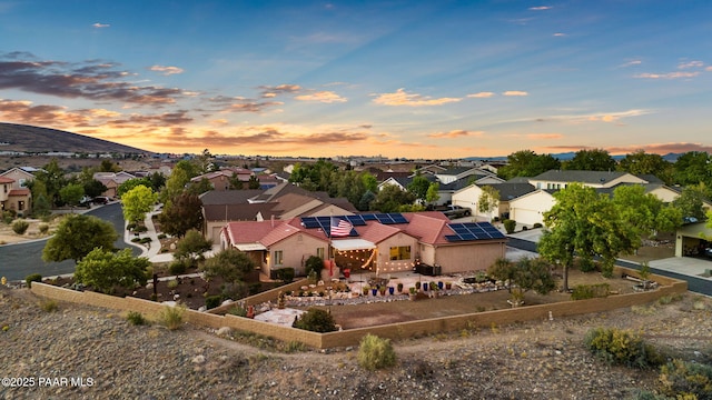 aerial view at dusk with a residential view