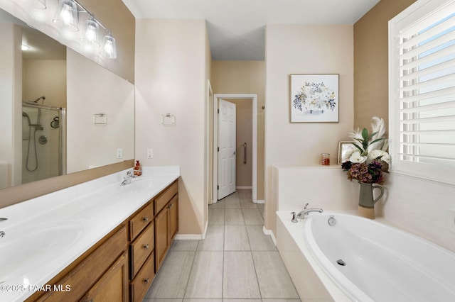 full bathroom with a sink, a garden tub, double vanity, and a shower stall