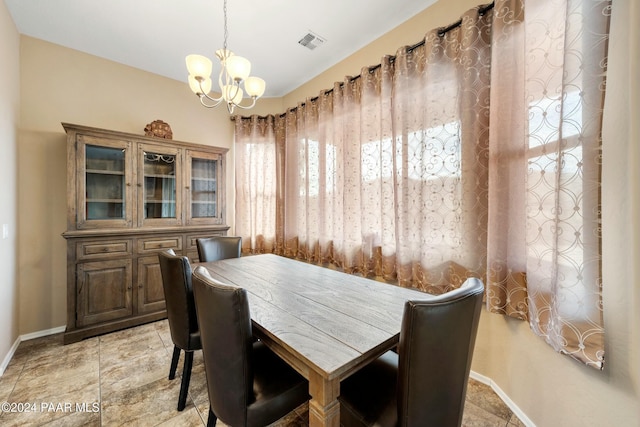 dining room featuring an inviting chandelier