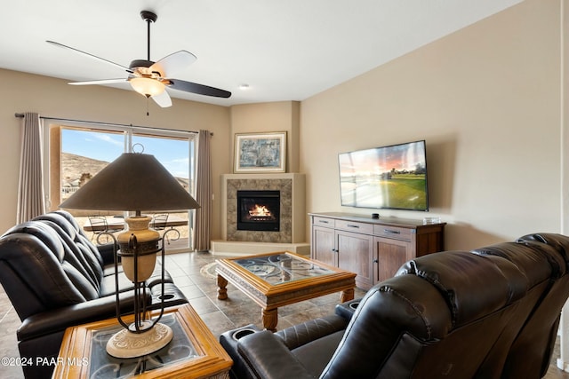 tiled living room with ceiling fan