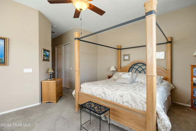 bedroom with carpet, ceiling fan, and a closet