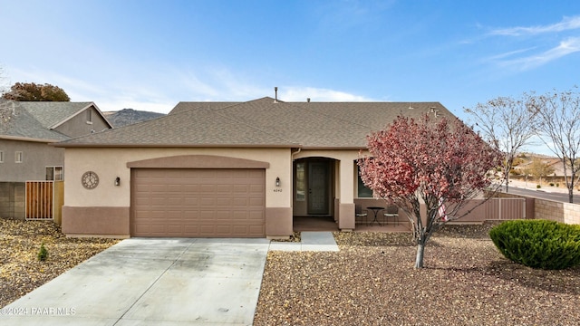 single story home featuring a garage