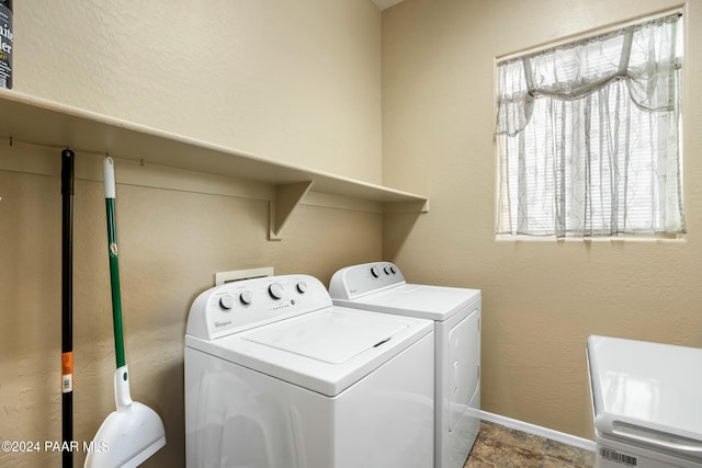 laundry area featuring washing machine and dryer