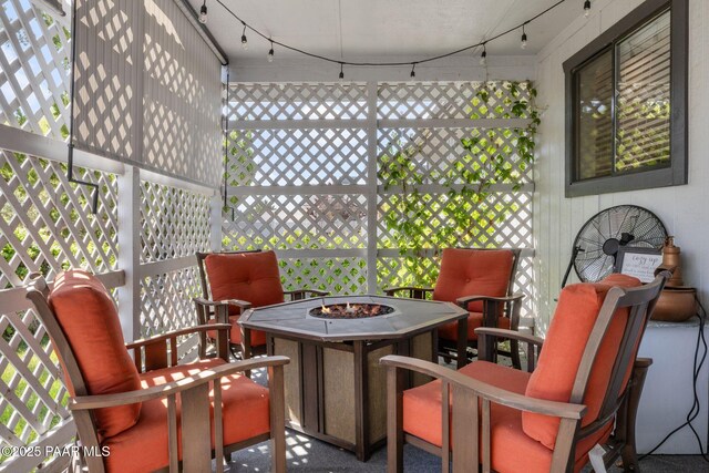 4361 N Covina Cir, Prescott Valley, AZ 86314 - sunroom featuring rail lighting, an outdoor fire pit, and plenty of natural light