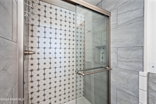 bathroom featuring walk in shower