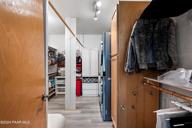 walk in closet featuring light wood-type flooring