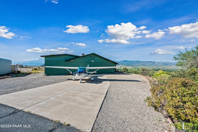 exterior space featuring a mountain view