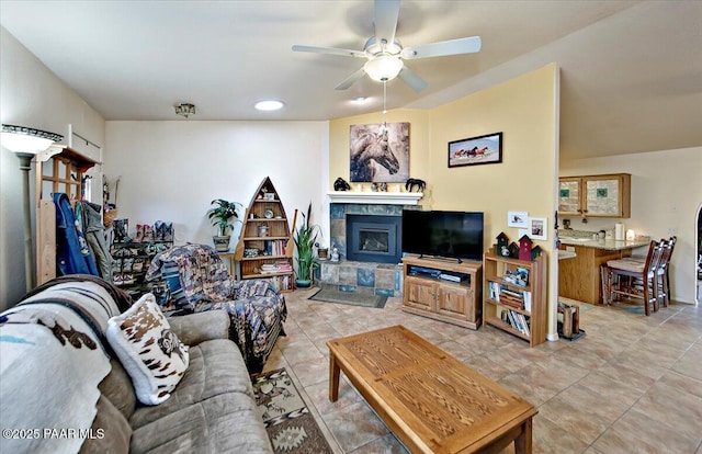 6174 N Viewpoint Dr, Prescott Valley, AZ 86314 - living area with light tile patterned floors, ceiling fan, and a tiled fireplace