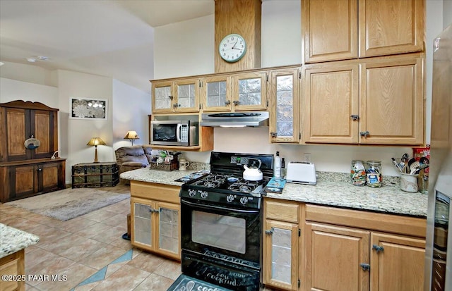 6174 N Viewpoint Dr, Prescott Valley, AZ 86314 - kitchen featuring light stone counters, light tile patterned flooring, glass insert cabinets, under cabinet range hood, and appliances with stainless steel finishes