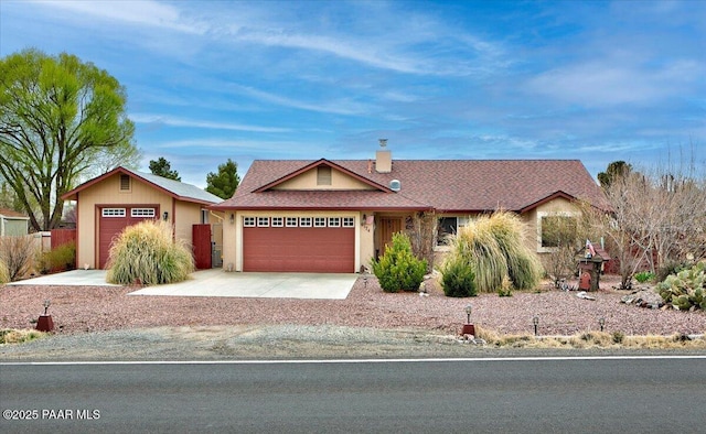 6174 N Viewpoint Dr, Prescott Valley, AZ 86314 - ranch-style home featuring stucco siding, concrete driveway, an attached garage, a shingled roof, and a chimney