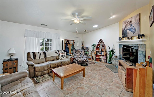 6174 N Viewpoint Dr, Prescott Valley, AZ 86314 - living area featuring light tile patterned flooring, visible vents, and ceiling fan