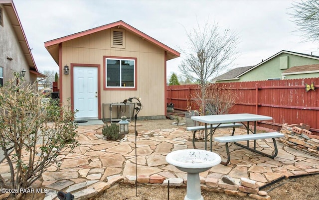 6174 N Viewpoint Dr, Prescott Valley, AZ 86314 - exterior space featuring an outdoor structure, outdoor dining area, and a fenced backyard