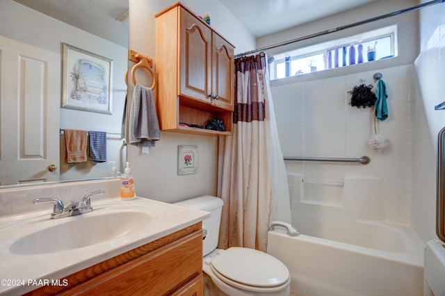 full bathroom with shower / bath combination with curtain, toilet, and vanity