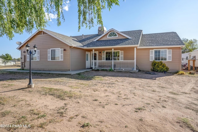 ranch-style house with a porch