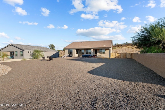 back of house with a patio area