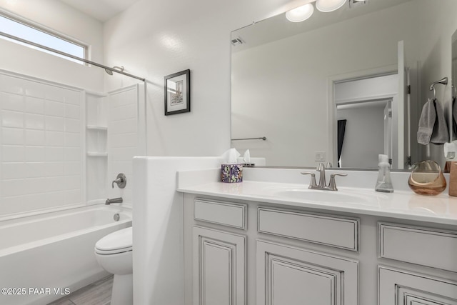 full bathroom with vanity, bathing tub / shower combination, toilet, and visible vents