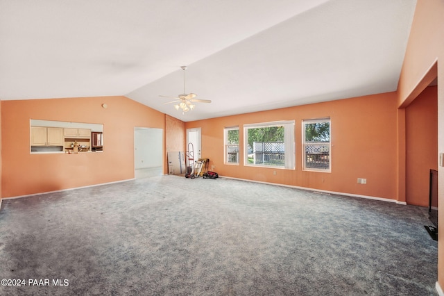 unfurnished living room featuring carpet flooring, ceiling fan, and lofted ceiling