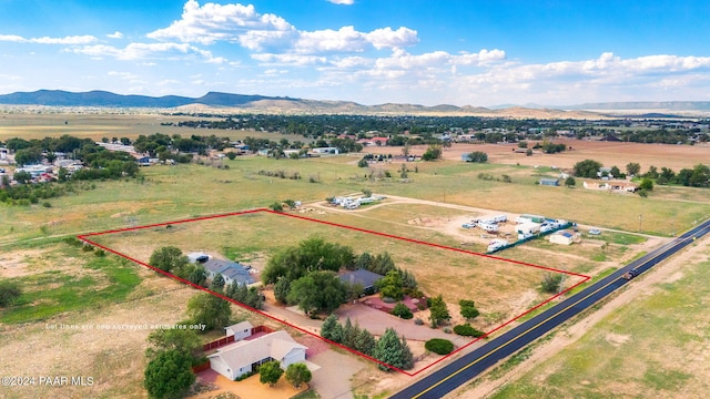 bird's eye view featuring a mountain view and a rural view