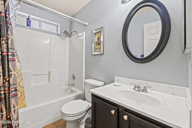 full bathroom with vanity, toilet, and shower / bath combo