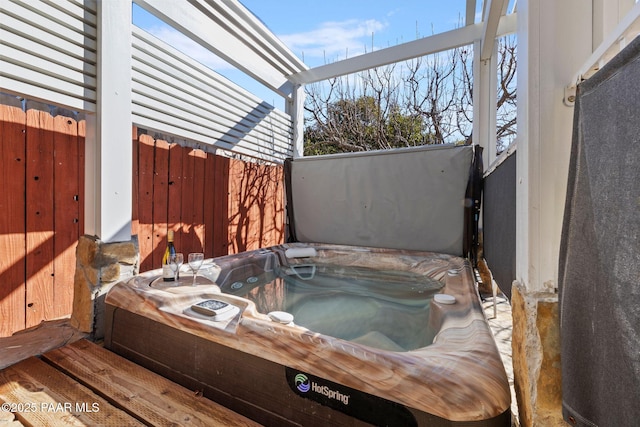 view of patio with a hot tub