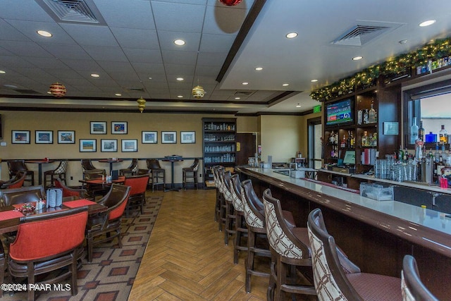 bar featuring parquet floors