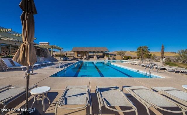 view of pool with a patio area