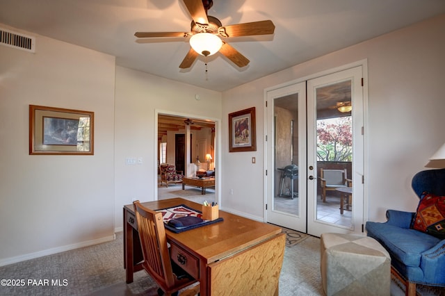 home office with carpet floors, visible vents, baseboards, french doors, and a ceiling fan